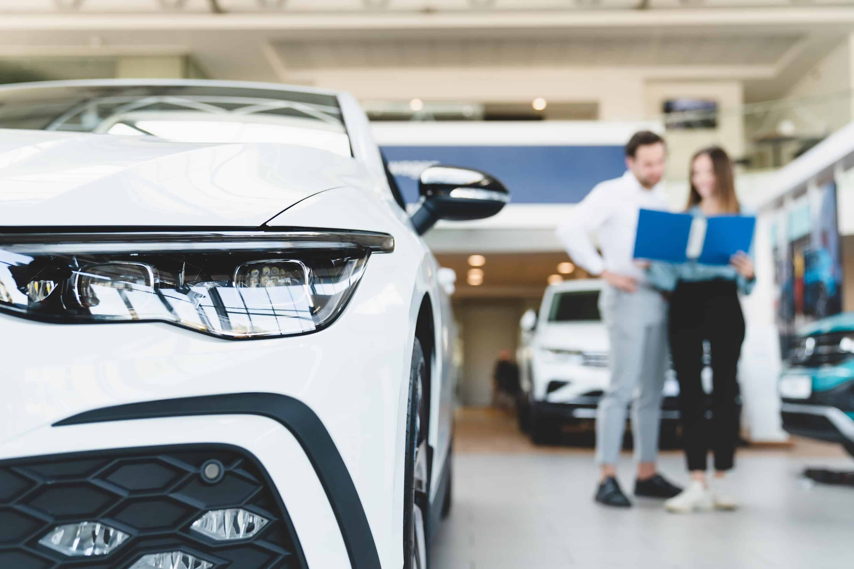 dealer car shop young family couple choosing new 2026 01 07 01 35 24 utc